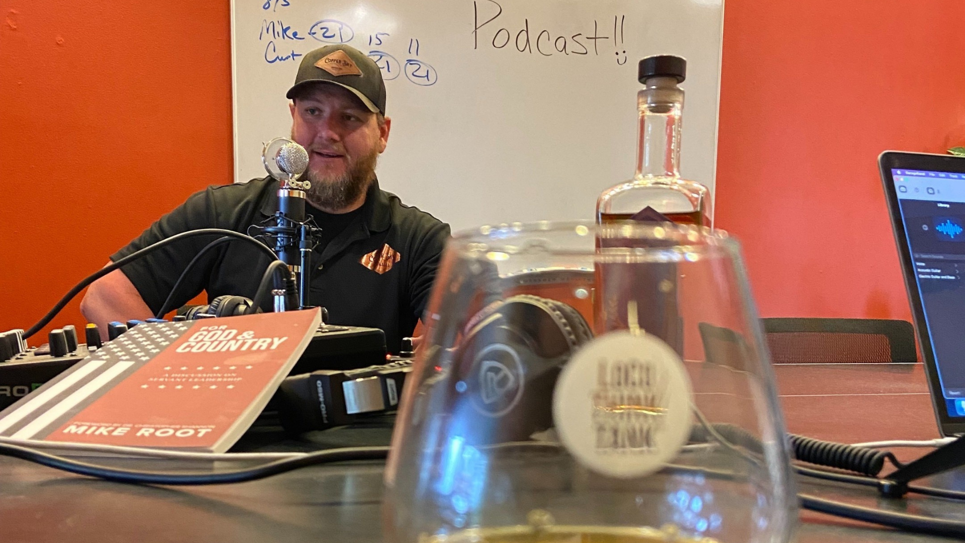 Podcast guest sitting in front of a microphone